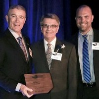 Don and Blake Bunting receive contractor of the year award